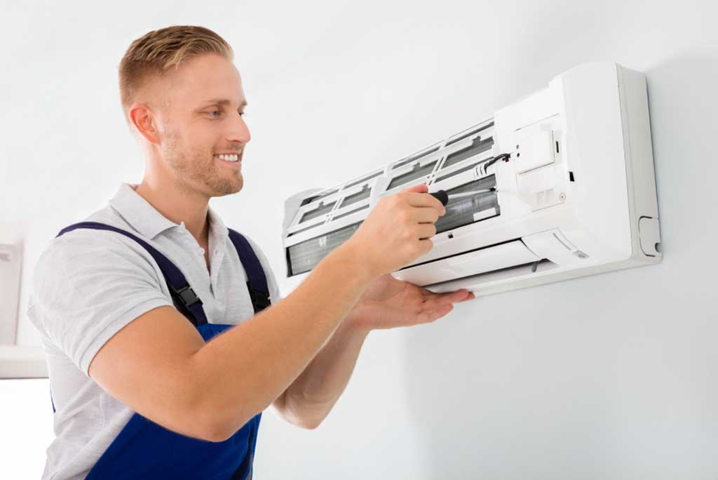 HVAC contractor fixing ductless mini-split system
